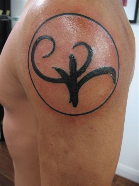 greek symbol for strength tattoo.